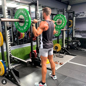 RAW Fitness Equipment 10kg Competition Bumper Plates in use — IWF standard, commercial gym